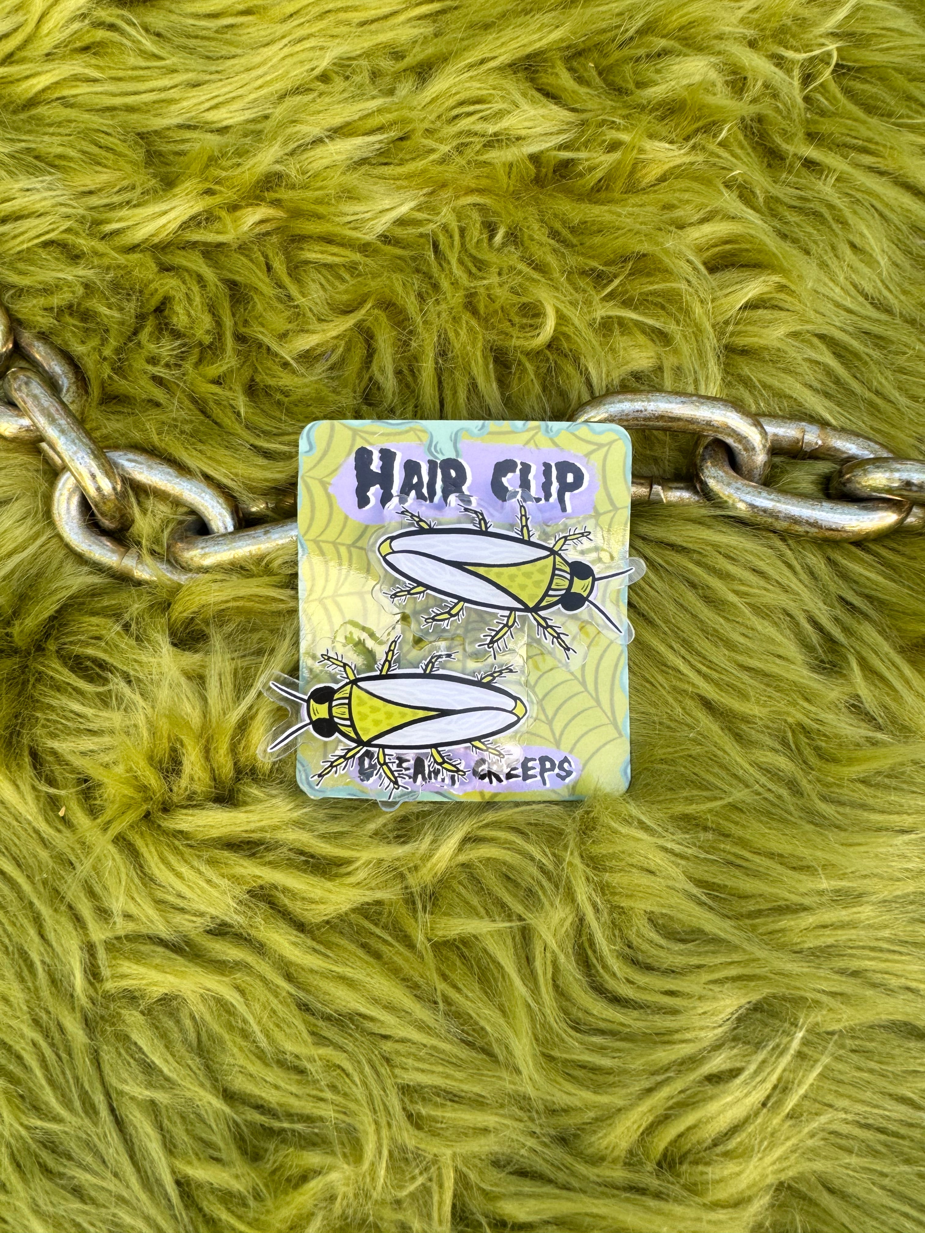 roach  hair / book clip